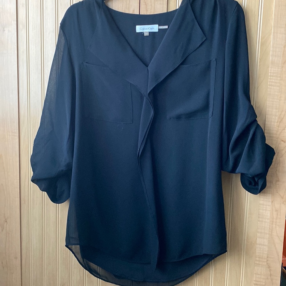 Calvin Klein lined top. Sleeves are sheer